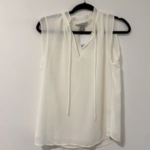 H&M white sheer blouse with liner. Size small. New with tags